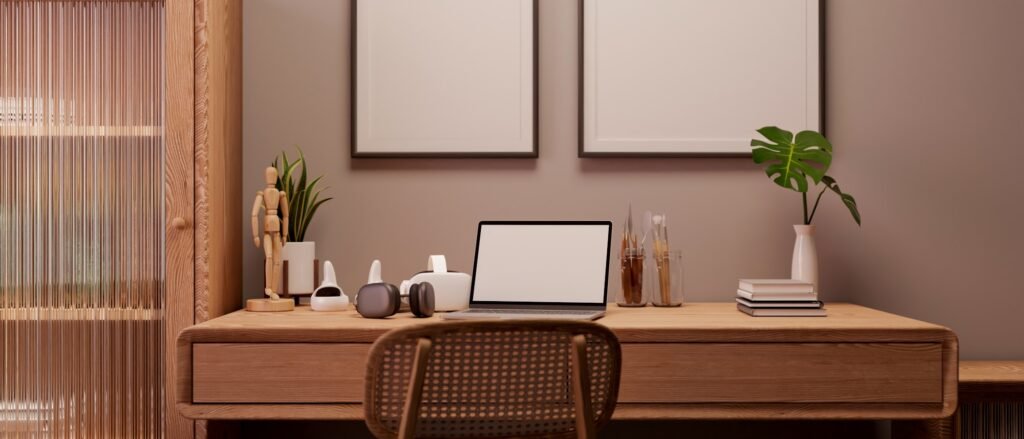 Minimalist home workspace with wood furnitures, laptop and decor on wood table against wall